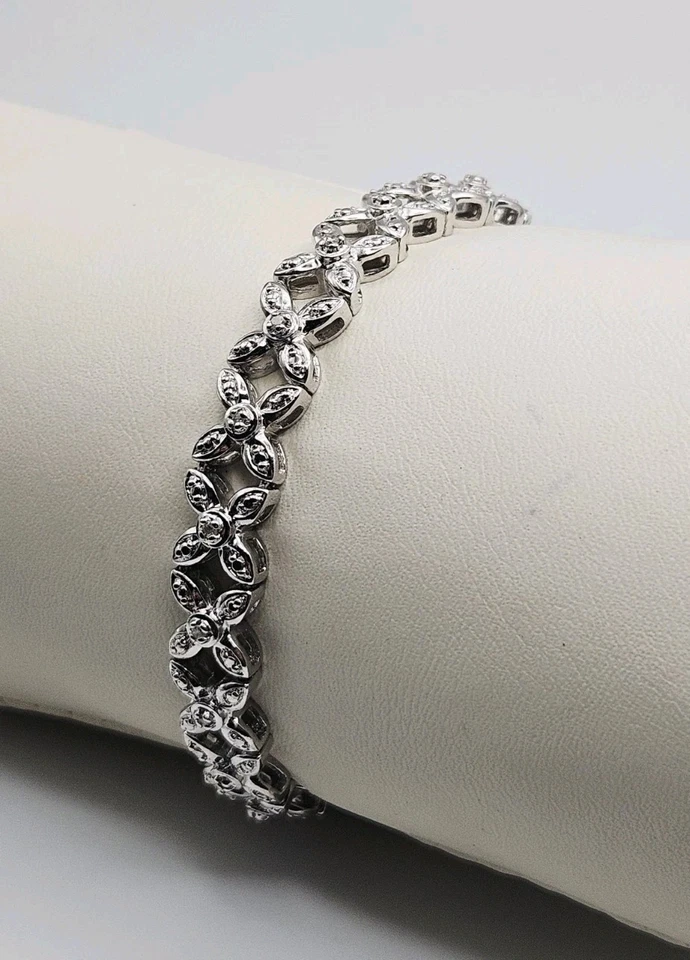 Brazalete tenis Ross Simons plata esterlina diamante flor 7" Foto 2 de 4