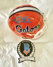 UNIVERSITY OF FLORIDA GATORS TIM TEBOW signed RIDDELL MINI HELMET BECKETT BAS