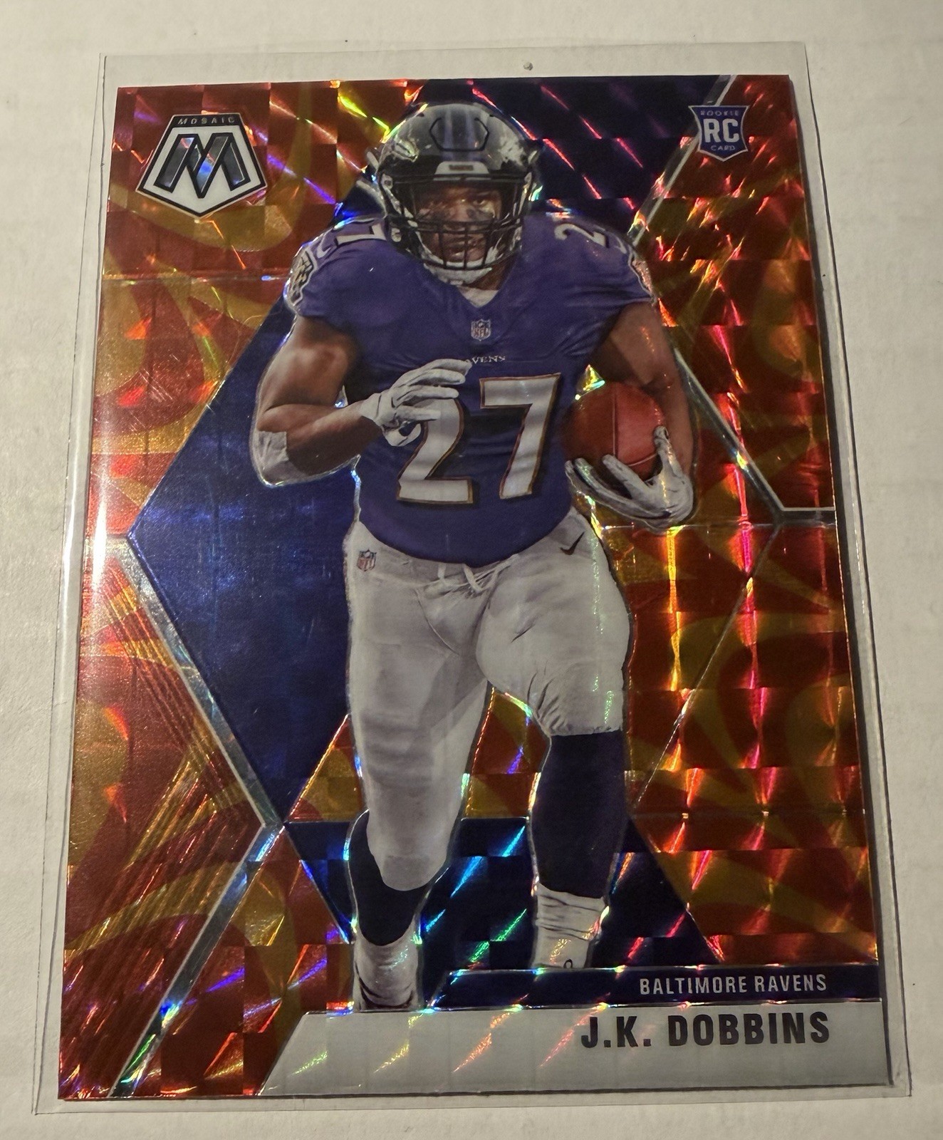2020 Panini Mosaic - J.K. Dobbins Reactive Orange #223 RC