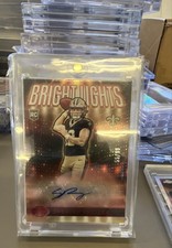 2024 Panini Bright Lights Signatures Spencer Rattler Red /99 (AU, RC)