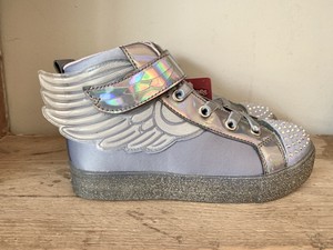 girls sketchers size 11