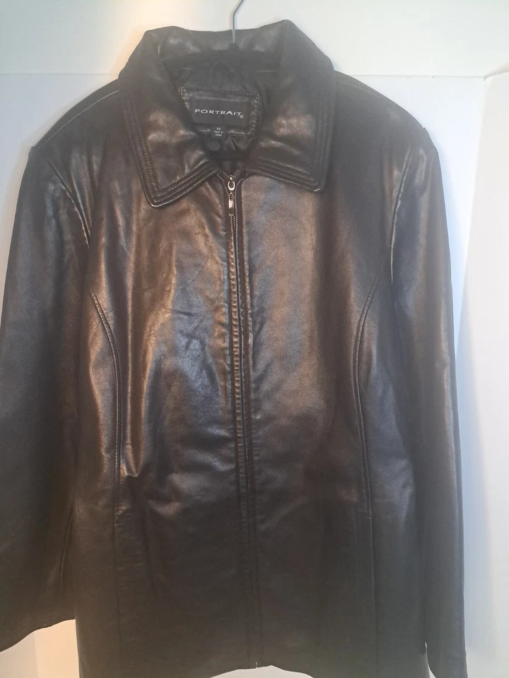 Chaqueta de cuero genuino retrato talla 1X mujer negra*usada en excelente estado* ver fotos para medidas