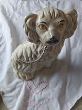 Staffordshire-style King Charles Spaniel figurine.