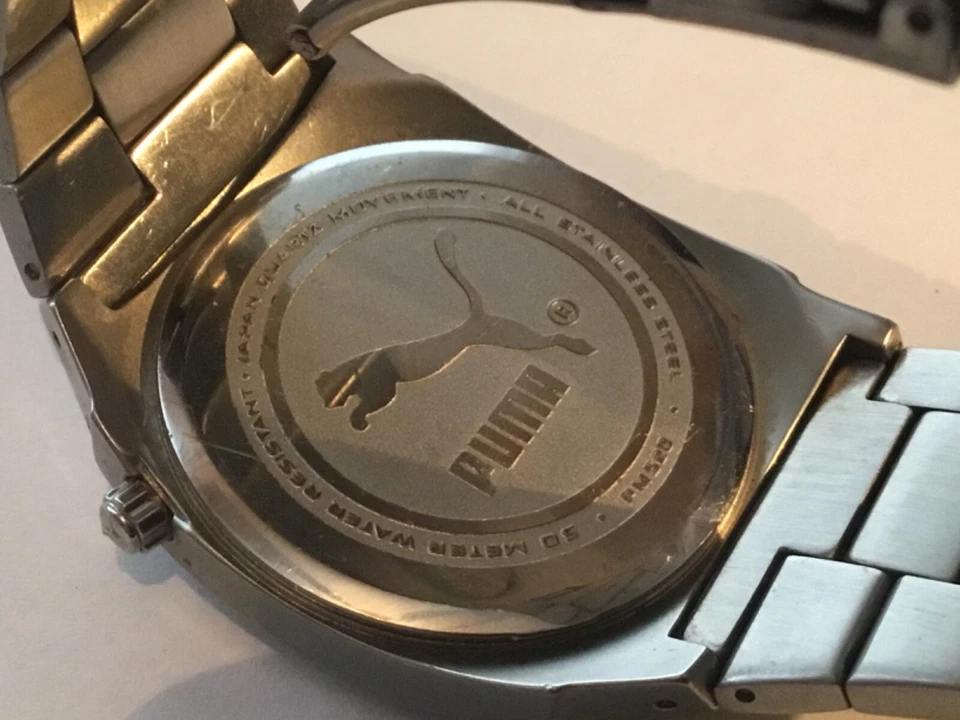 Reloj de cuarzo vintage Puma para hombre correa plateada nuevo Batt Foto 4 de 4