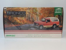 Greenlight 1994 Ford Bronco Eddie Bauer Edition Electric Red & Bronze 1/18