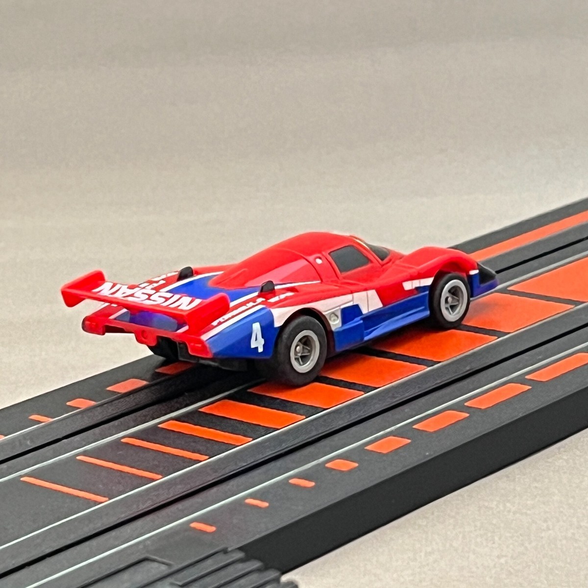AFX Nissan March 86G Nismo Red 0027 Turbo HO Slot Car Tomy
