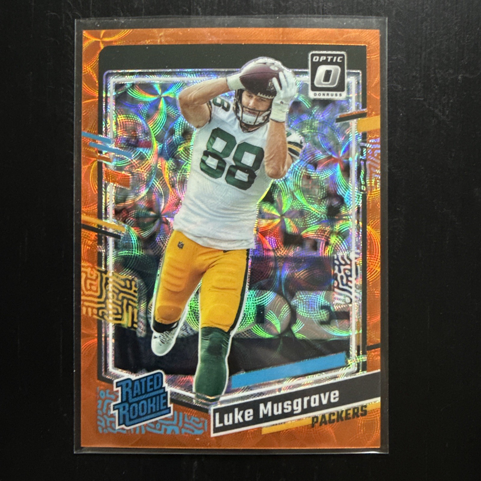 2023 Optic Football Luke Musgrave #241 Orange Scope /79 Rated Rookie RC Packers