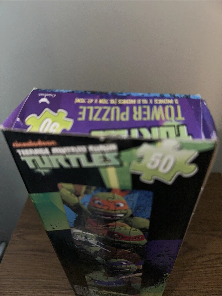 Rompecabezas Torre Tortugas Ninja Adolescentes Mutantes Usado 50 Piezas 18"x5" Todo Aquí Foto 2 de 2