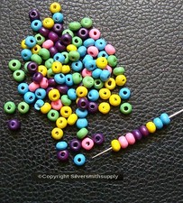 100 4mm Wood spacer beads Assorted Colors .5mm hole 12.5" When Strung WB012