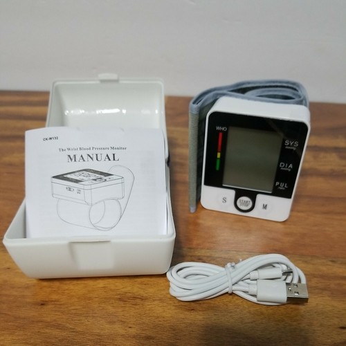 Misuratore di pressione sanguigna da polso CK-W132 LCD display digitale - Foto 6 di 6
