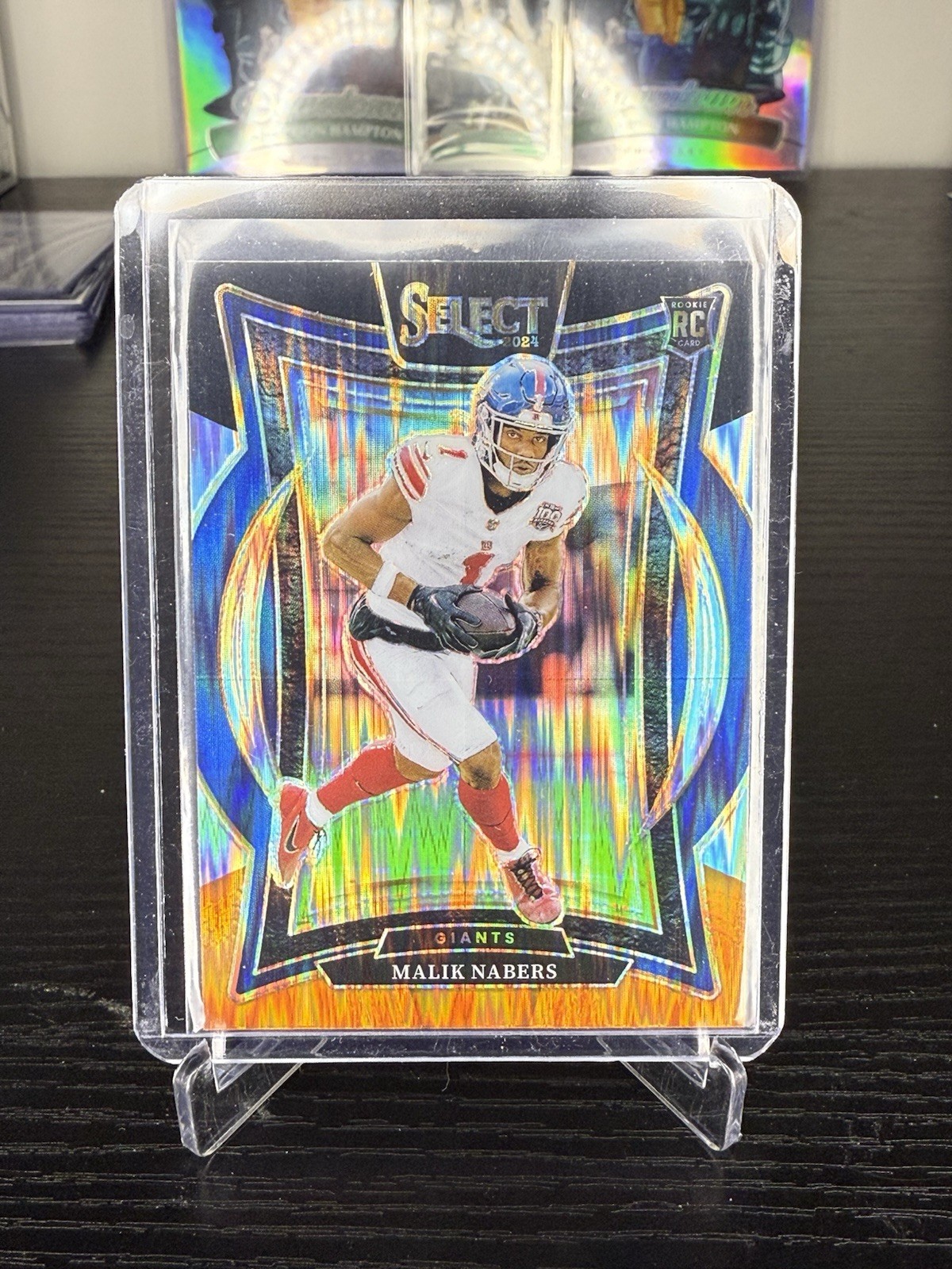 2024 Panini Select - Concourse Malik Nabers #29 Black & Orange Shock Prizm (RC)