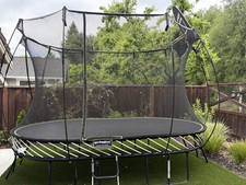 Springfree 8x 13ft oblong Outdoor Trampoline with new in box Enclosure Net