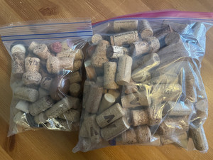 Lot of 150 wine, champagne corks & wooden scotch tops