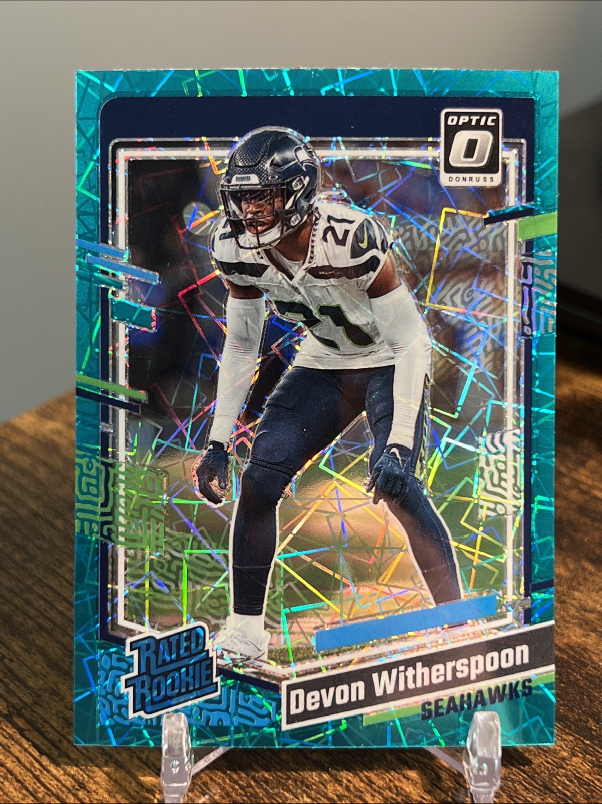 2023 Devon Witherspoon Optic #292 Teal Velocity Prizm SP RC Seahawks