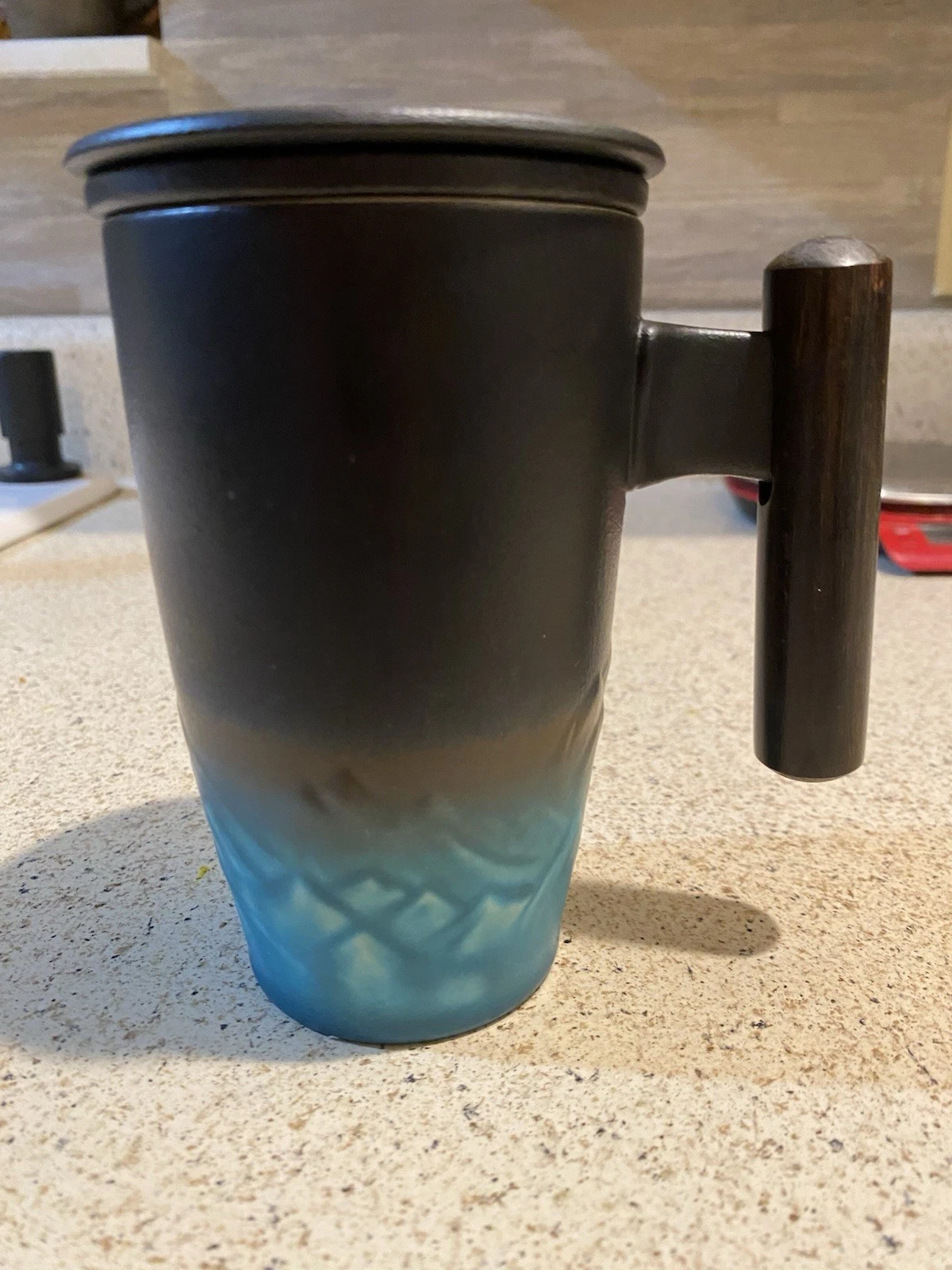 Ceramic Tea Cup With Infuser And Lid by Suyika Tomotime Wooden Handle
