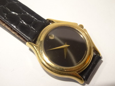 Movado Model 87.E4.0823 Ladies Gold Plated Steel Museum Watch Black Dial 