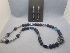 Iridescent gray glass and matte blue beaded necklace and earring set 22in.