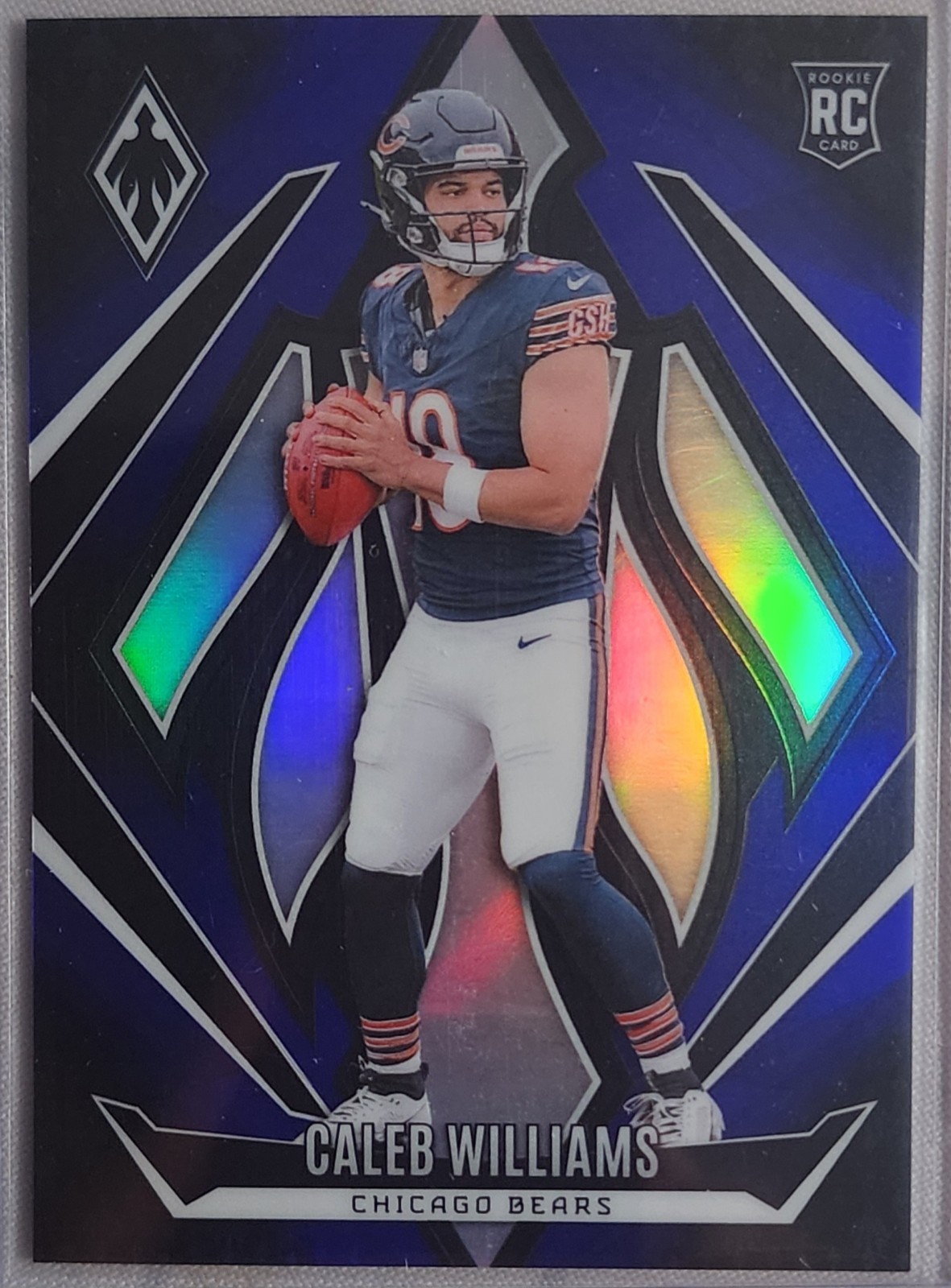 2024 Panini Phoenix - Rookies Caleb Williams #151 Blue Fade /249 (RC)