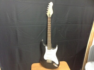 encore electric blac and white guitar