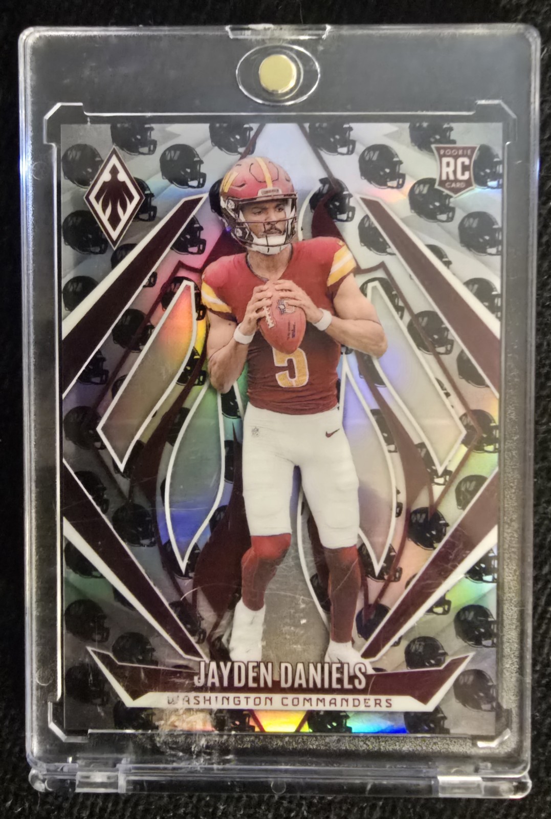 2024 Panini Phoenix - Rookies Jayden Daniels #198 Team Helmet /399 (RC)