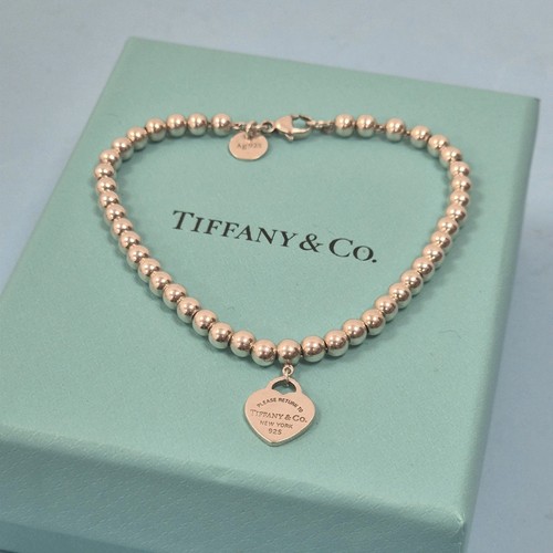 Tiffany & Co. Return To Sterlingsilber Mini Herz 4 mm Perlenarmband Größe 7 Zoll.