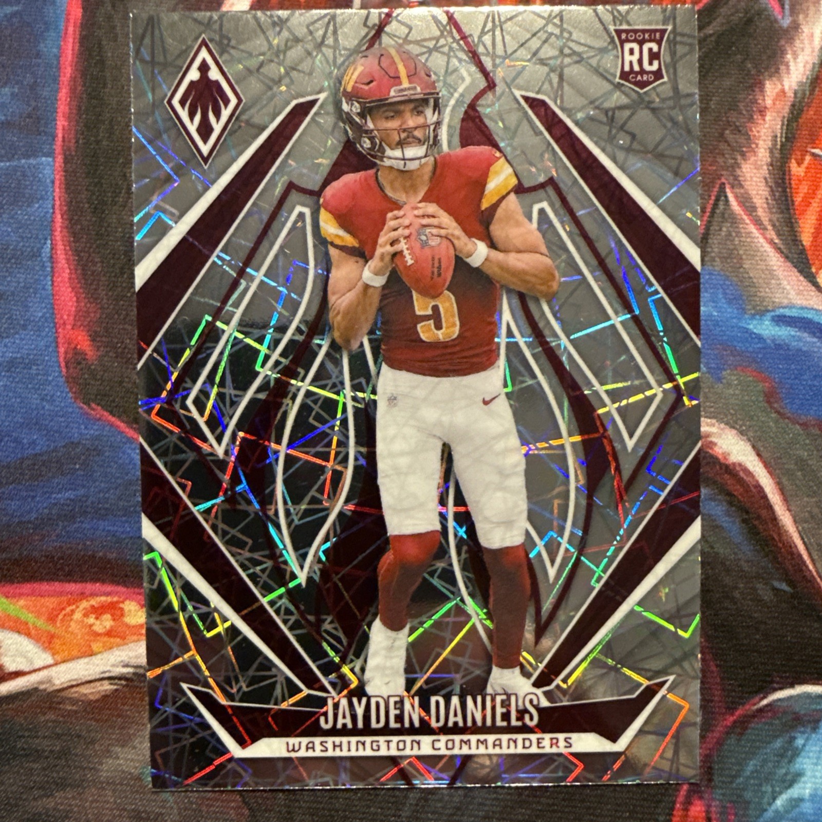 2024 Panini Phoenix - Rookies Jayden Daniels #198 Lazer (RC)