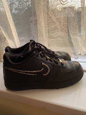 nike black with gold tick