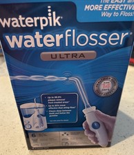 WATERPIK WATER FLOSSER ULTRA 6 TIPS  10 PRESSURE SETTINGS WHITE SEALED NEW S