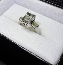 Silver Ring with Emerald-Cut Clear Stone and Side Stones