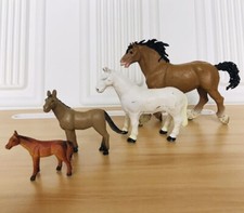 Lot Of 4 Different Sizes Plastic Toy Horses