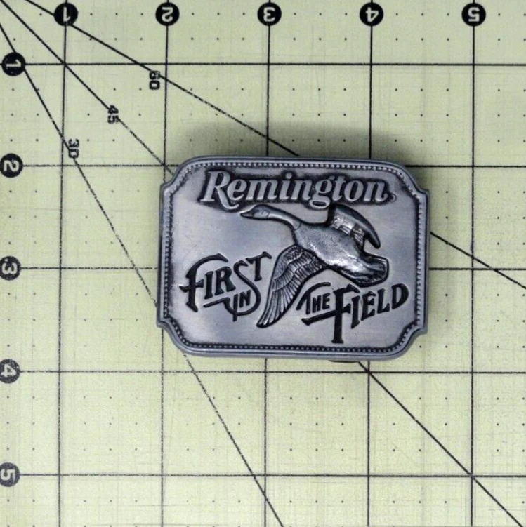 Remington Arms Co abito promozionale cintura fibbia Canada Goose Sid Bell vintage anni 80 W.NOX675