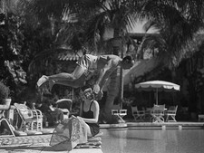 Actor Douglas Fairbanks Sr Dives over wife Sylvia Ashley into a po- Old Photo
