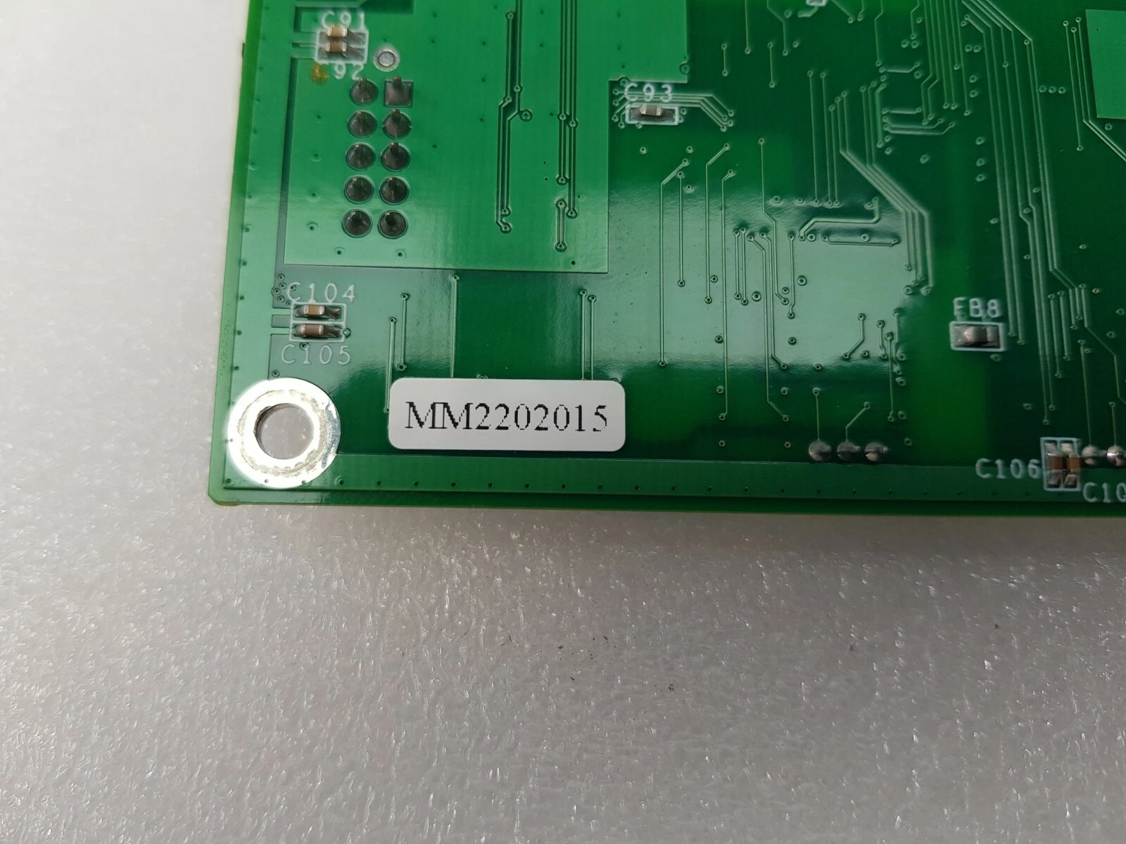 Close-up of the MM2202015 sticker on the solder side