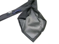 Cravatta uomo amanti sette pieghe sfoderata in seta nera a punti spillo bianchi