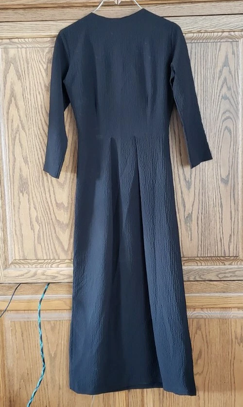 Mennonite in top a black dress