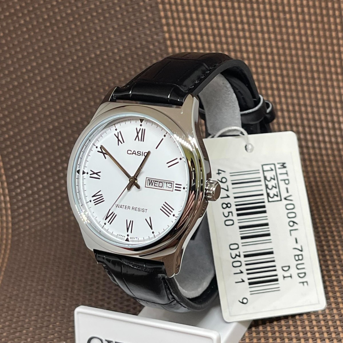 Casio MTP-V006L-7C Orologio Uomo Analogico, Cinturino In Pelle, Quadrante Argento Con Indici, Giorno E Data, 38 Mm