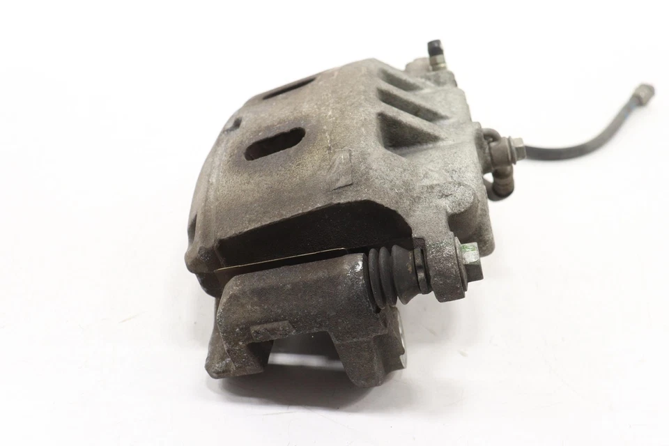 Pinza de freno de disco delantera izquierda Nissan Armada 2005-2024 OEM Foto 3 de 4