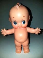 Powder Dispenser 7.5 In Kewpie Doll Made in Korea For Mangeisen’s Omaha, Nebr.