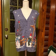 Bobbie Brooks blue Christmas sweater vest with snowmen and Santa Claus design.