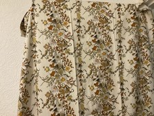 A pair of chintz flowered curtains