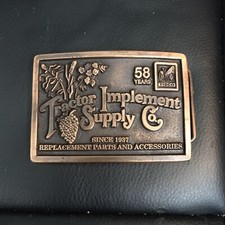 RC09115 VINTAGE 1995 TRACTOR IMPLEMENT SUPPLY CO. FARMING BELT BUCKLE 58 Years