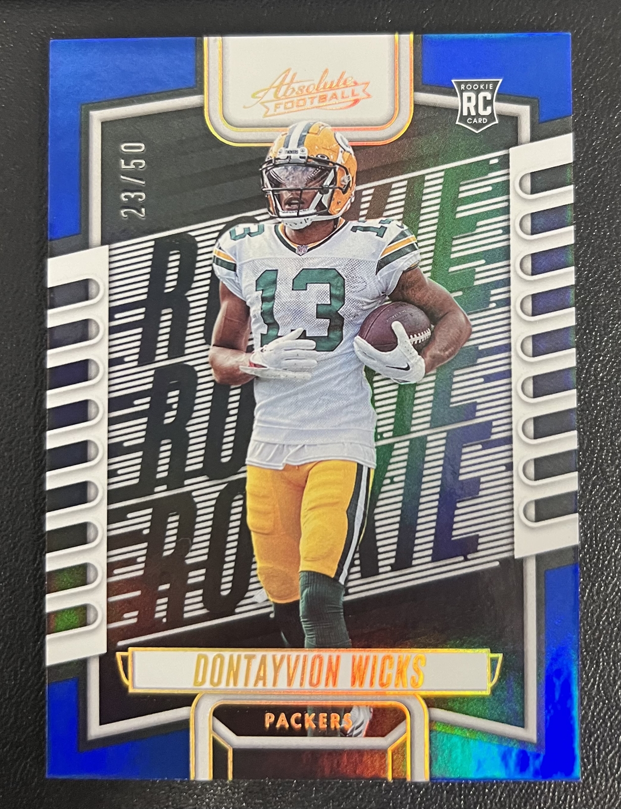 2023 Panini Absolute #199 Dontayvion Wicks Blue ROOKIE CARD /50 Packers