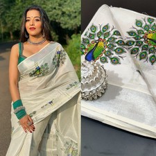 Kerala traditional Silver Tissue Peacock Saree, Beautiful Kerala designs, Onam