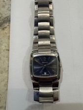 Gucci 8500M watch featuring a square case, stainless steel band, new battery