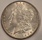 ​1887 Morgan Silver Dollar - Philadelphia Mint (No Mint Mark) - 90% Silver VF