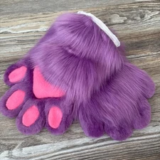 The animal's fluffy violet paws were made by hand.SALE!