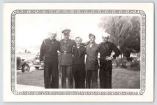 Black White Photo Of A Of Two Army And Three Navy Servicemen Returning From WW2