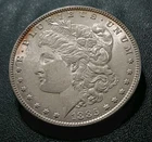 1885 Morgan Silver Dollar in AU/BU