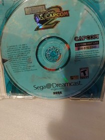 Marvel vs. Capcom 2, videogame w/manual & strategy guide book. sega dreamcast.