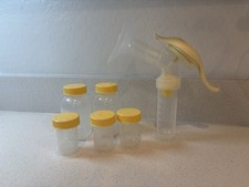 Breast Milk Bottles And Hand Pump